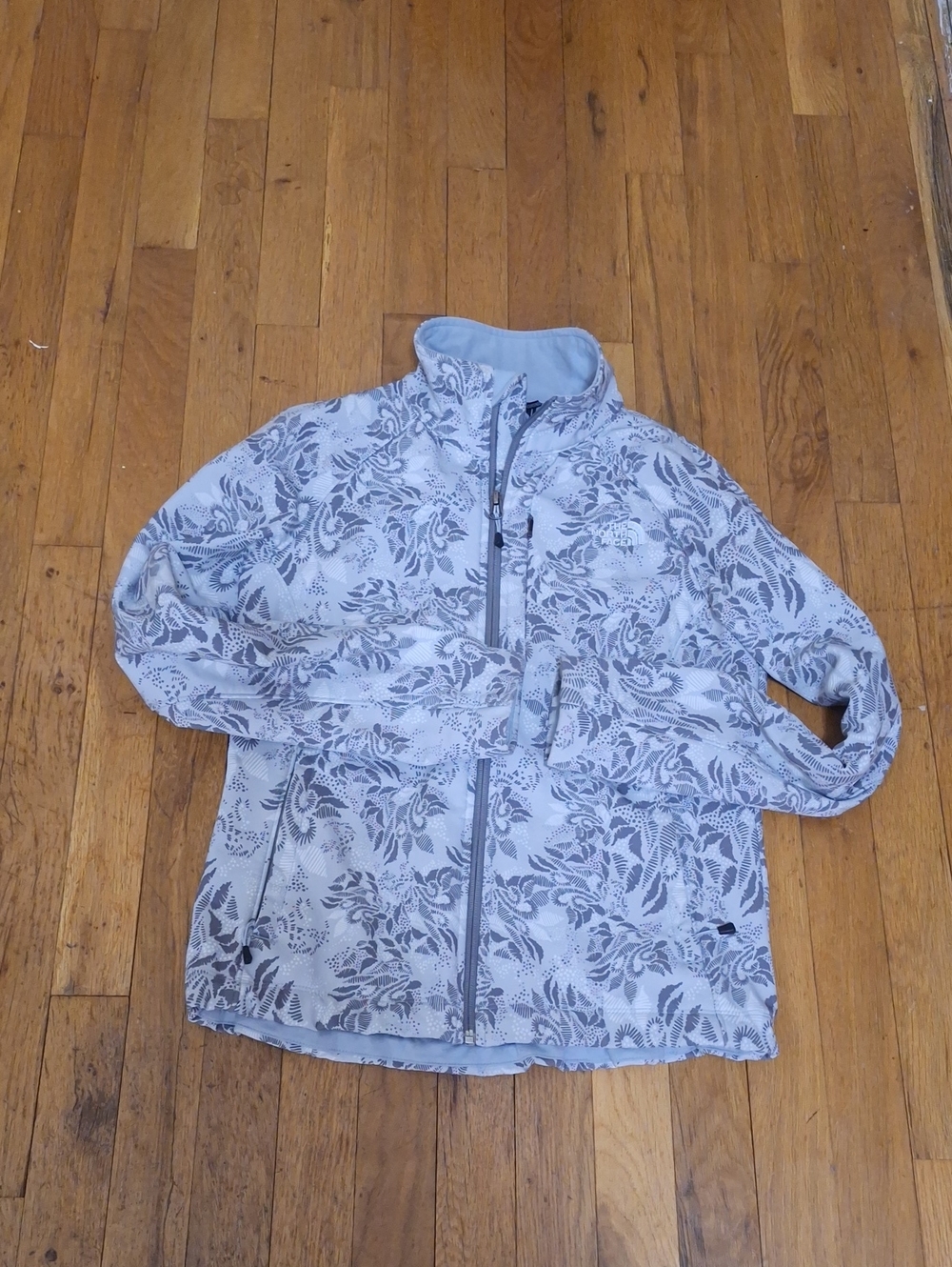 The North Face Light Gray Fleece Jacket with Subtle Print